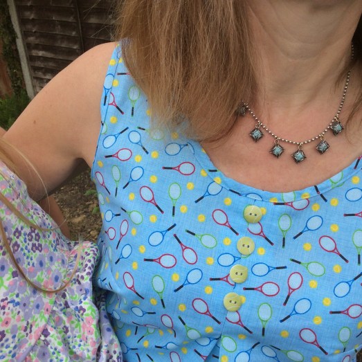 a close up of the fabric and tennis ball buttons